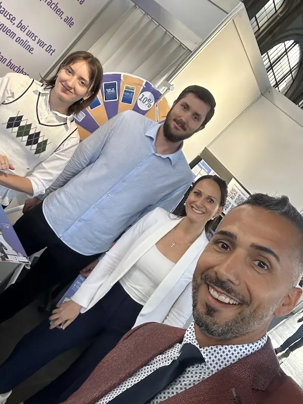 Daniela Lovric and Birol Isik with team members at professional networking event for digital transformation
