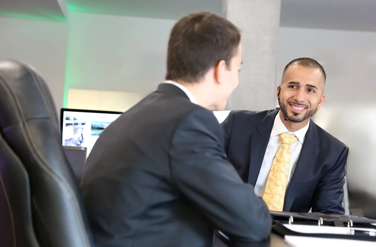 Professional one-on-one AI consulting session between Birol Isik and business client for strategy development